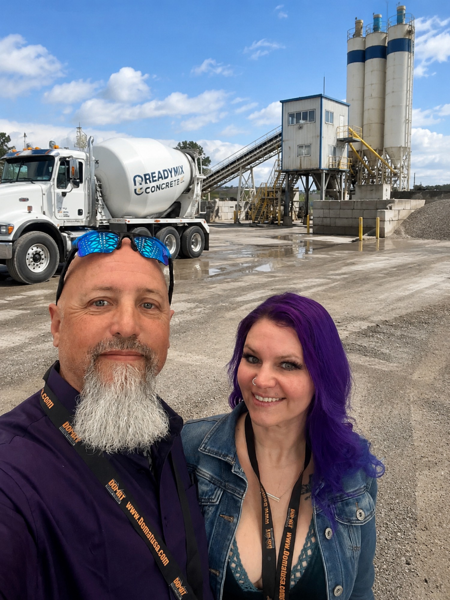 Chad and Brandy Cervantes, husband and wife team of Cervantes Concrete Consulting, at a ready-mix concrete plant